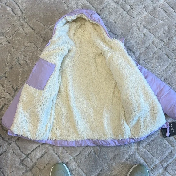 New Eddie Bauer girls jacket in size 6. Lilac purple.